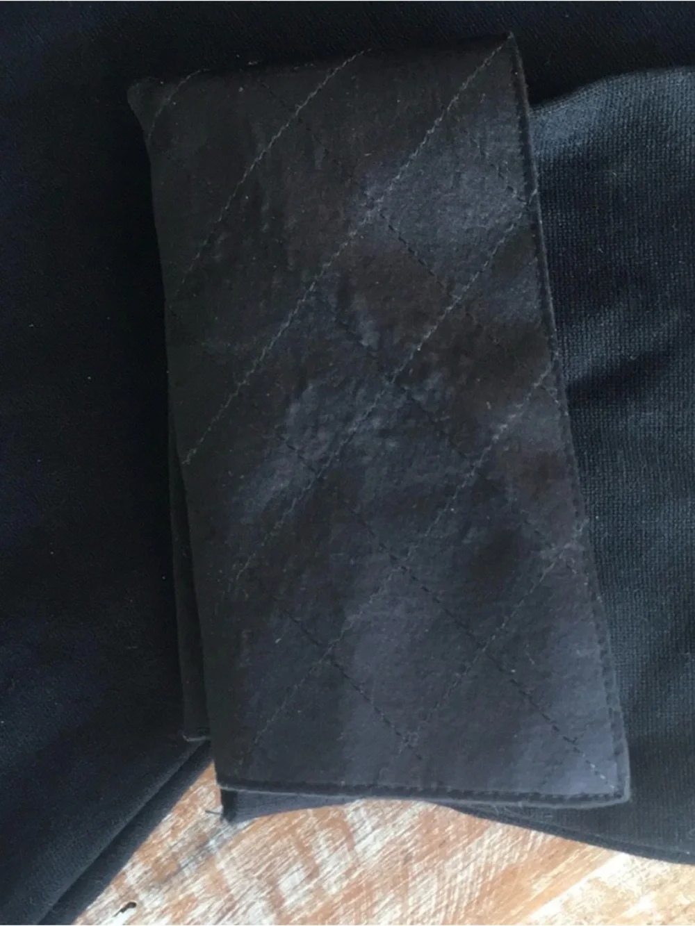 CHANEL black quilted boatneck employee uniform top